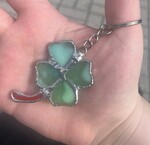 Glass Clover in Hand by Alex Kolb and Benjamin Sanchez
